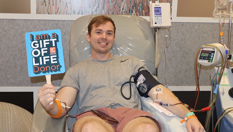 Brian is shown in Gift of LIfe's Adelson Collection Center as he donated blood stem cells to save his matching patient.