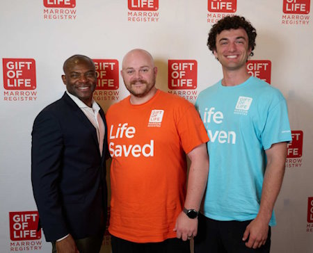 In April 2024, at the Gift of Life-Miami Beach Police Department pickleball tournament, a Blackfoot, Idaho police officer Kenneth Williams was introduced to his stem cell transplant donor Banks Lomel. The pair are standing in front of a Gift of Life photo backdrop with Miami Beach Police Chief Wayne A. Jones on the left, Kenneth in an orange "Life Saved" tee shirt in the center, and Banks in a turquoise "Life Given" shirt on the right. 