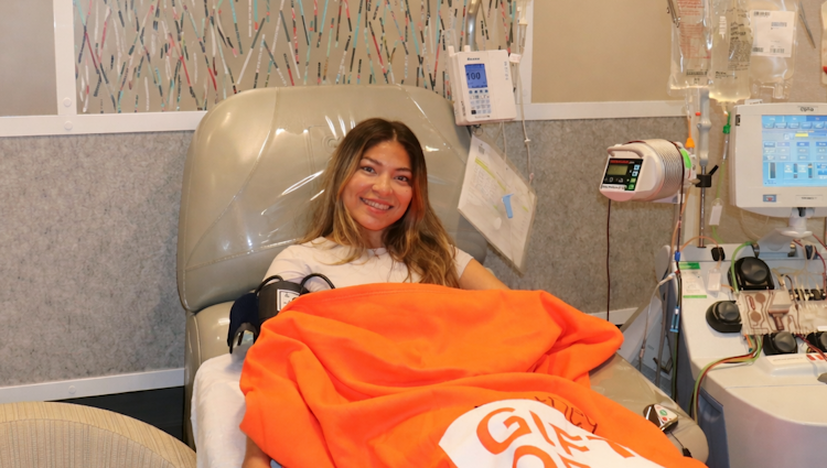 Gift of Life stem cell donor Britney is shown donating stem cells at our in-house collection center to help a man diagnosed with leukemia recover his health.