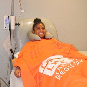 Ashley is shown donating stem cell in the Adelson Collection Center to help save a patient battling blood cancer. 