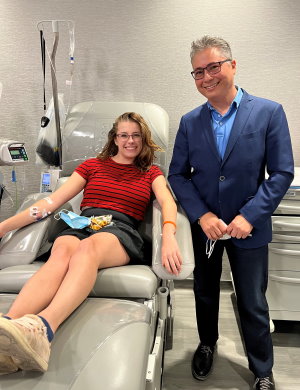 Stem cell donor Anna was surprised when Gift of Life's CEO and founder Jay Feinberg stopped in to thank her for being the 1000th donor to give stem cells at the in-house collection center. 