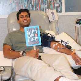 Stem cell donor Anirudh, a South Asian male, is shown donating blood stem cells at the Adelson Collection Center to help save his recipient's life. 