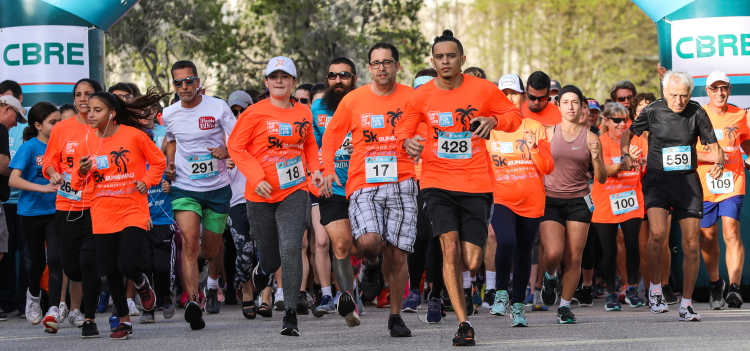 Runners leave the starting line in the 2020 Steps for Life 5k of South Florida.