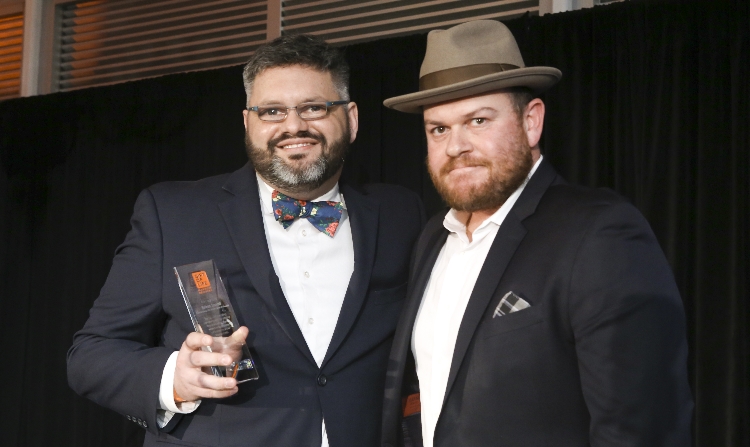 Assistant Director of Hillel at Vanderbilt University Brian Small (l)  received Gift of Life's Celebrating Life Award. It was presented by last year's honoree, Jeremie Braun (r).