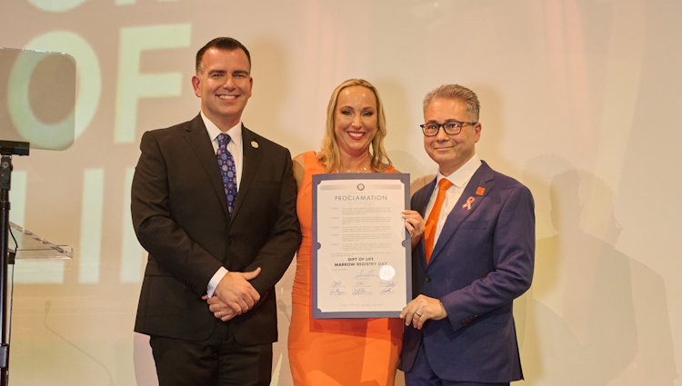 Miami Beach Commissioner Alex Hernandez presents Gift of Life Director of Development Robyn Malek and Founder/CEO Jay Feinberg with a proclamation declaring November 10 as Gift of Life Day in the city. 