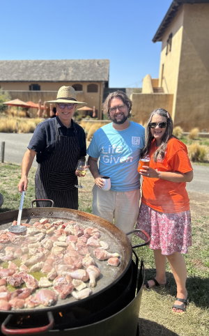 Gift of Life transplant recipient and cancer survivor David Llodra (l) introduced stem cell donor Zack Arestad (c) to his recipient Kim Frost-Olin (r), he cooked a feast to celebrate their meeting. The event was an annual winery tour at Nicolson Ranch Winery, led by David as a fundraiser for the marrow registry. 