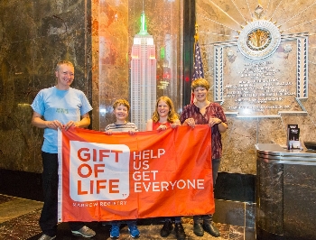 The Kemp family visited the Empire State Building to change the lights to orange in honor of World Marrow Donor Day.