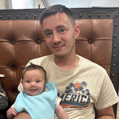 Gift of Life stem cell donor Jacob and his baby daughter.  