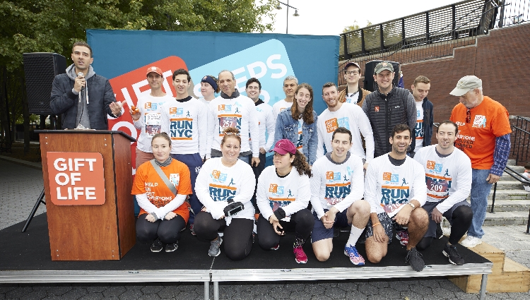 NBC anchorman Adam Kuperstein recognizes a large group of marrow donors and recipients at the Gift of Life 5k on October 14, 2018, in Battery Park.