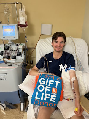 Gift of Life Marrow Registry stem cell donor Owen Hern is shown at the collection center during his donation. In November 2023 he met the father of two whose life he saved, William "Chane" Anderson, at a Florida Panthers Hockey Fights Cancer night game. 