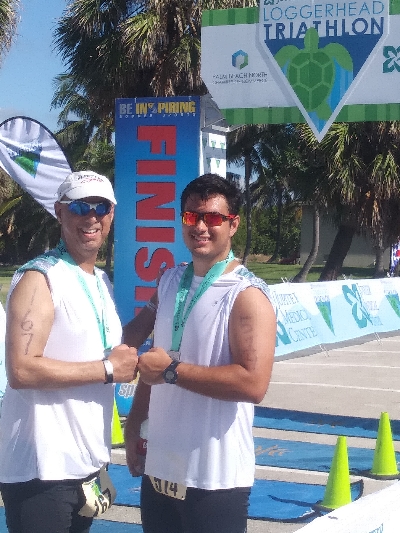Leukemia survivor Mike Magi and his son James competed in the Loggerhead Triathlon only months after Mike received a stem cell transplant to cure leukemia.