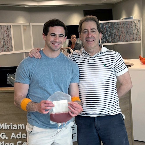 Stem cell donor Ben's father Jim accompanied him to Gift of Life's collection center and is obviously proud of his son donating cells to help save a woman battling to survive leukemia.