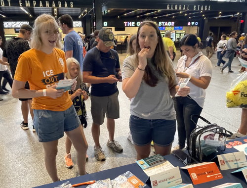 Nashville SC fans swab their cheeks to join the Gift of Life Marrow Registry during Childhood Cancer Awareness Month in September 2022. 