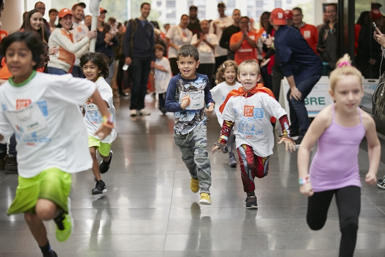 Superheroes sprint to cure blood cancer at the 2017 Steps for Life 5k in New York City's Brookfield Place.