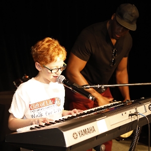 Matthew Welling entertains to celebrate his ten year transplant anniversary.