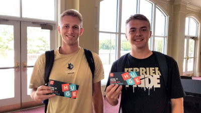 Sammy (r) and his roommate Grant both joined Gift of Life Marrow Registry at a Student Athletic Advisory Committee Meeting.  Grant donated stem cells in 2020 and Sammy was called to donate in 2022. In this photo they are both smiling and holding up their cheek swab kits during the SAAC meeting when they joined Gift of Life's registry. 