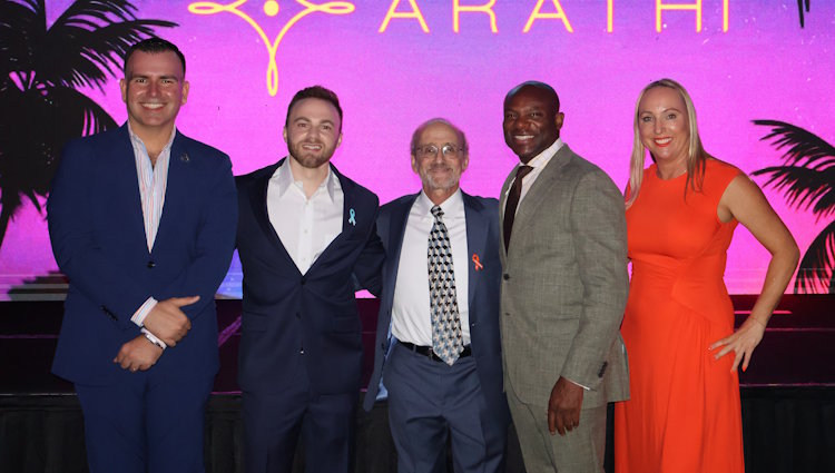 Gift of Life Marrow Registry was honored by the Miami Beach Chamber of Commerce at their 2025 gala. In attendance (L-R) were Miami Beach City Commissioner Alex Hernandez, Gift of Life stem cell donor Noam Goldberg, lymphoma survivor Jay Goldman, Miami Beach Police Chief Wayne A. Jones, and Gift of Life Director of Development Robyn Malek. 