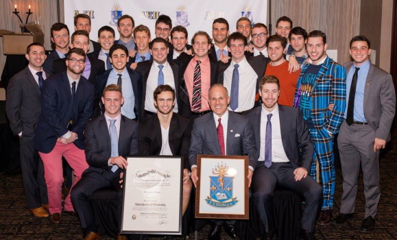 Stem cell donor Grant (pink slacks) at the chartering of a new AEPi chapter.
