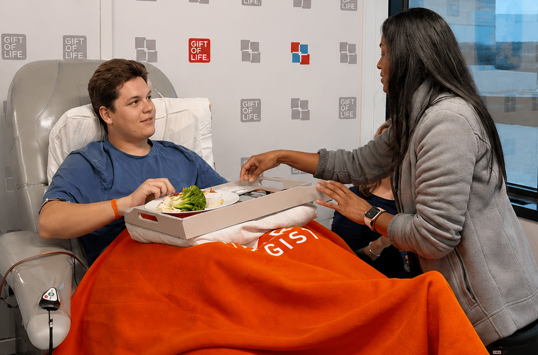 At Gift of Life's Adelson Collection Center, a donor is eating a gourmet lunch from a local restaurant during his stem cell collection.