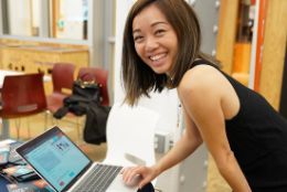 A young lady is signing up to join Gift of Life's marrow registry by completing the health questionnaire on a laptop computer.