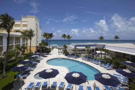 The pool deck area with the ocean in the background is a feature of the Opal Grand Resort, where Gift of Life's donors stay during their "donation vacation."